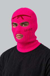 Cagoule Rave Rose — portée par notre modèle homme sur fond gris studio