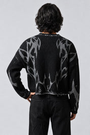 Pull Color Block Streetwear, porté de dos sur fond gris clair