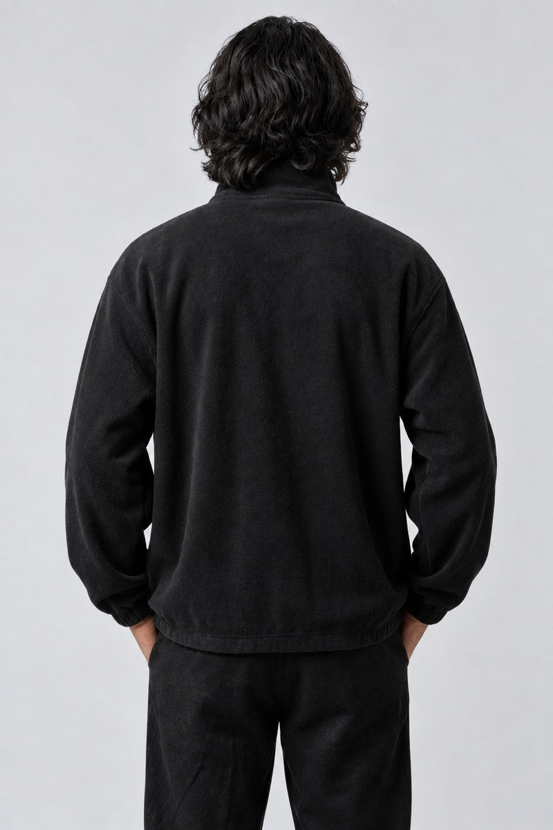 Pull Monaco, porté de dos sur fond gris clair