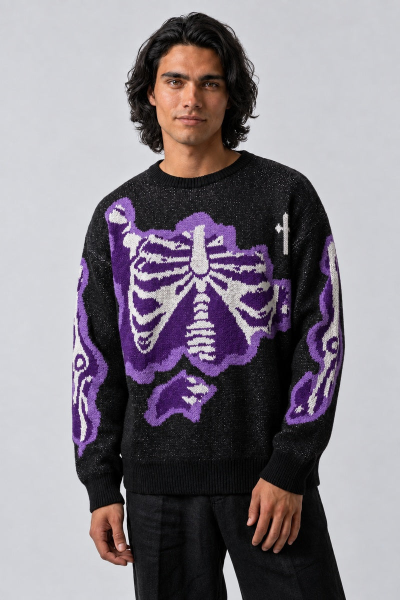 Pull Papillon Jacquard, porté de face sur fond gris clair