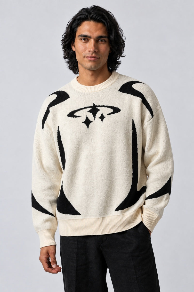 Pull Stellar crème en maille, porté de face sur fond gris clair