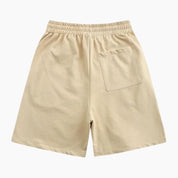 Short Y2K mixte édition 'Stay Safe' de couleur beige