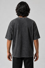 Dos uni du t-shirt Krull gris délavé, porté par un homme.