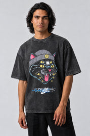 T-shirt Krull gris délavé, chat à quatre yeux jaunes et bonnet gris imprimé sur le devant.