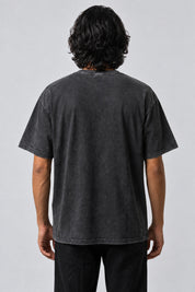 Dos uni du t-shirt Sunshine gris délavé, porté par un homme.
